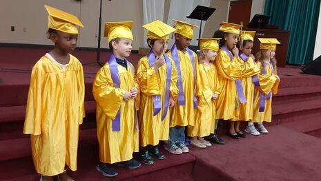 angel wings daycare kids graduate