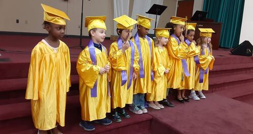 angel wings daycare kids graduate